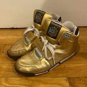 Gold Reebok high tops